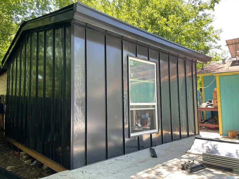 Black standing seam metal wall panels for Roof Inspection in Rosamond