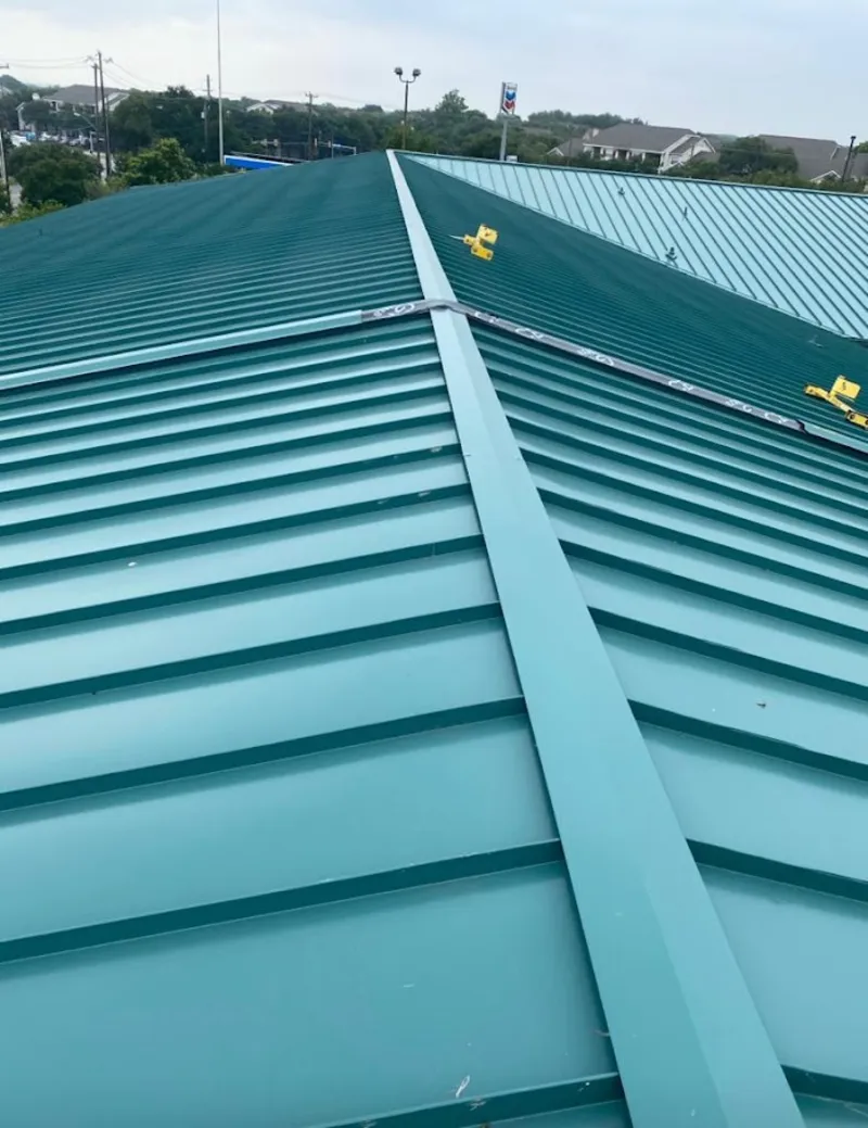 Green commercial metal roof ridge and valley for Metal Roof Repair in Rosamond